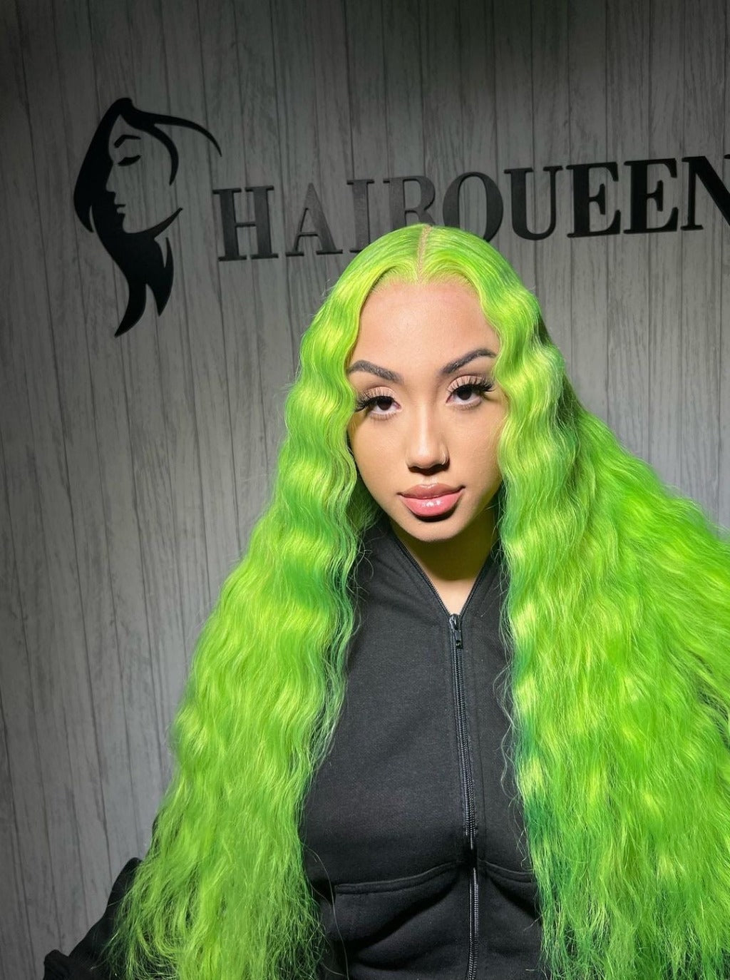 Lime green long wig with full waves, center part, and natural-looking hairline