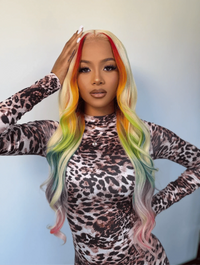 Long wavy pastel lace wig with blonde hair, red roots, and green-blue tips