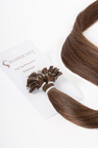 Chocolate brown hair extension weft with clip on card backing