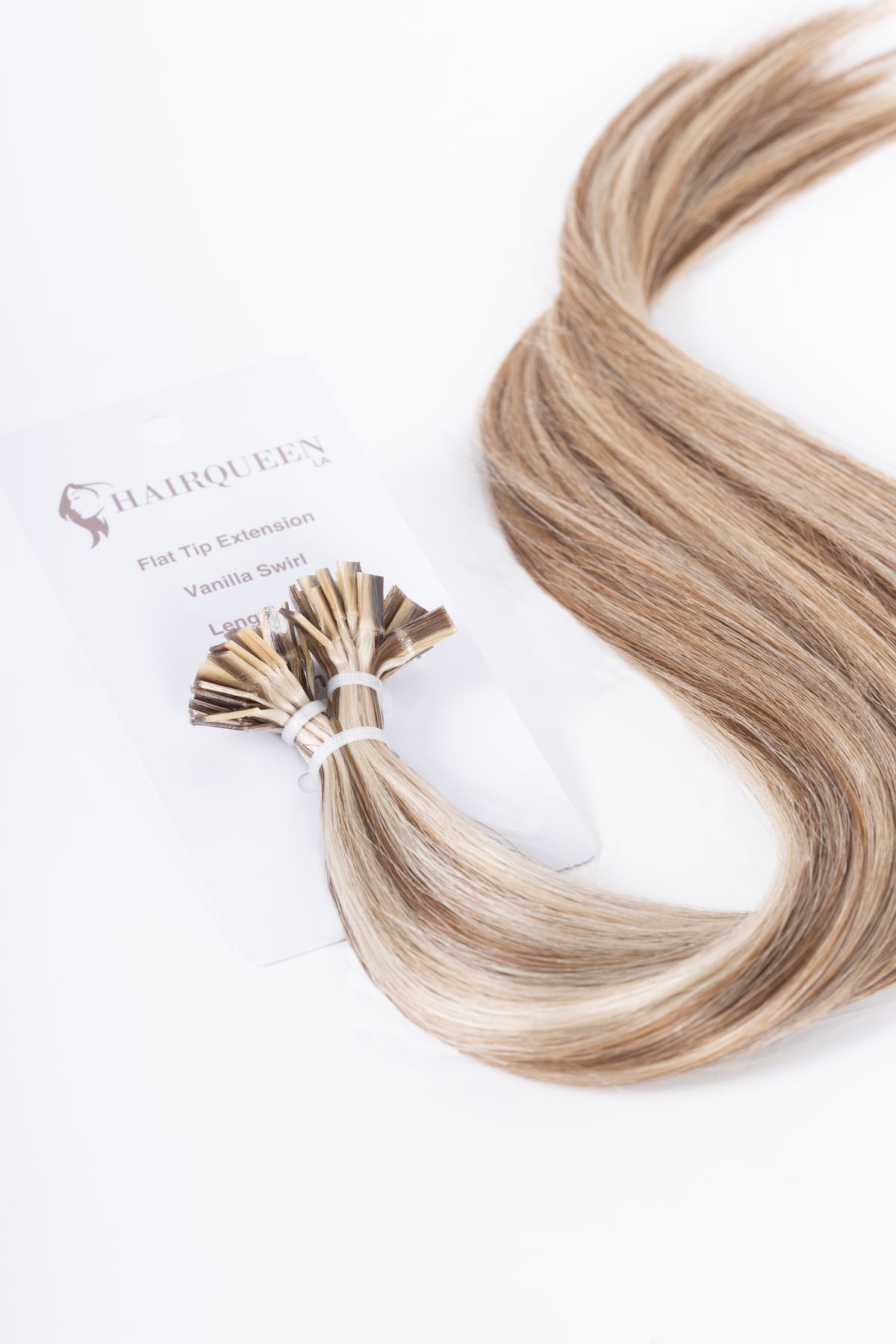K-Tips vanilla swirl hair extensions with attached keratin tips, light blonde streaks