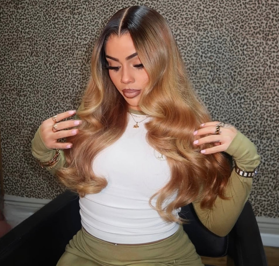 Center-part long wavy lace wig with dark root to golden-brown gradient