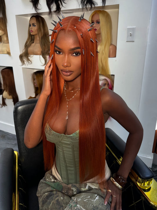 Long deep ginger lace wig with lace cap and metal clips, straight center-part hair