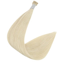 Hair extension bundle with blonde strands and gold bead at the top