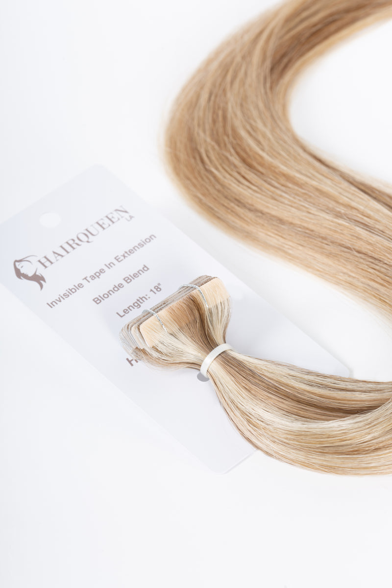 Invisible tape-in hair extension weft in blonde blend with attached tape strip