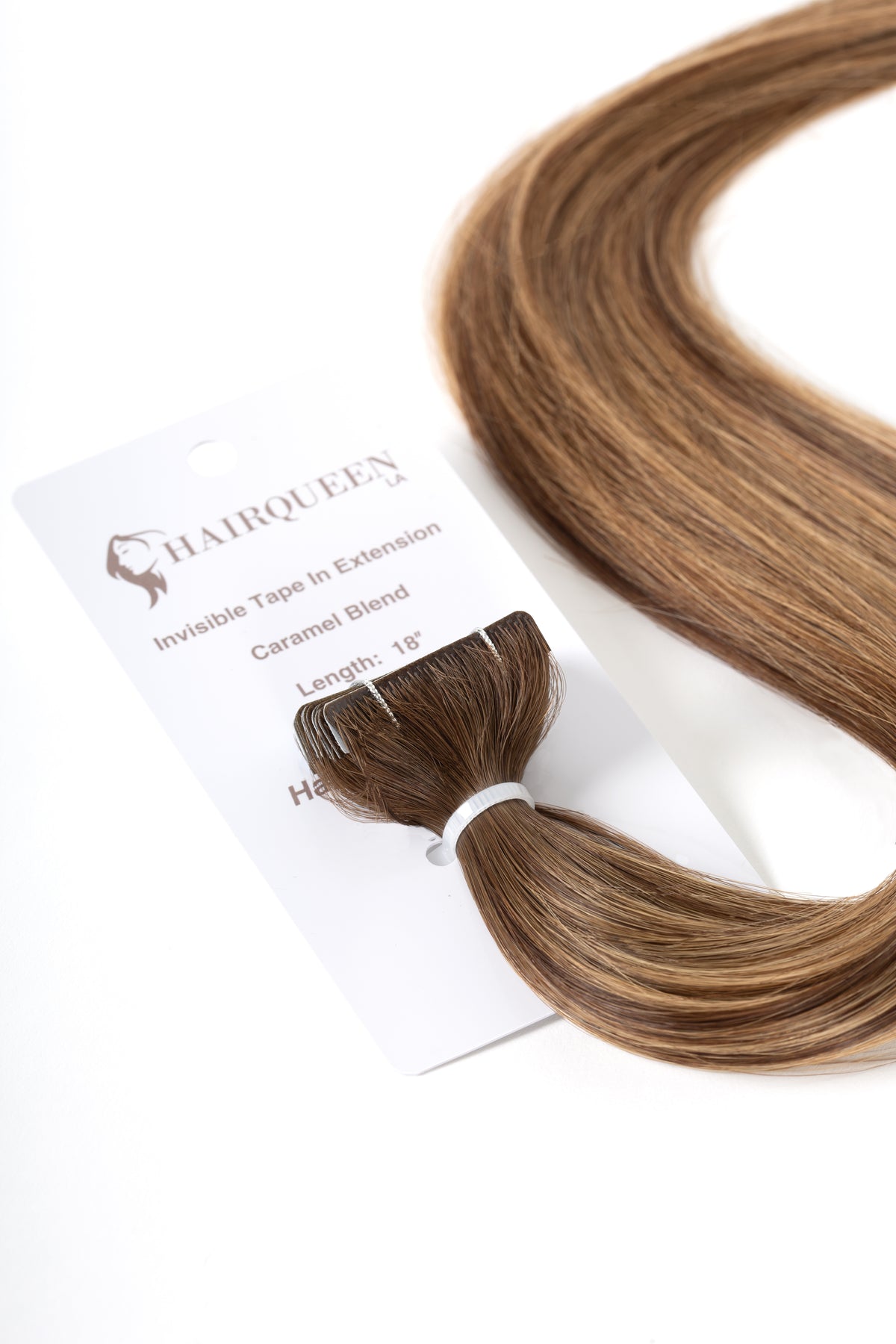 Caramel blend tape-in hair extension weft, with packaging card attached
