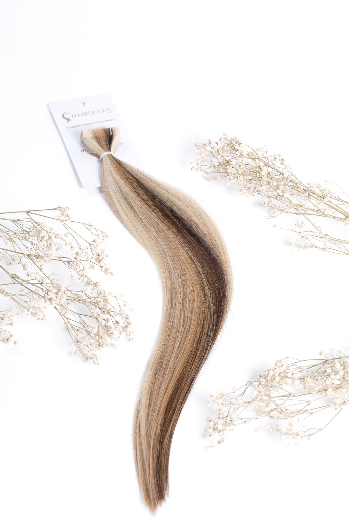 Vanilla swirl tape-in hair strand bundle with blended blonde and brown tones