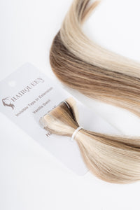 Vanilla swirl tape-in hair weft with long blonde and brown strands
