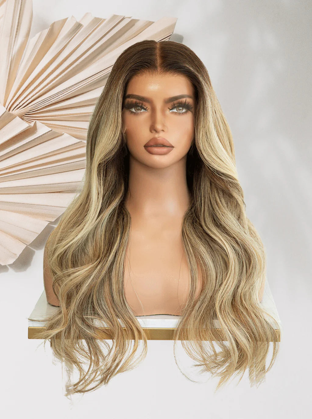 Glueless lace wig with long wavy blonde hair, darker roots and lighter lengths