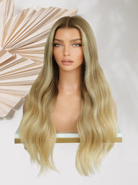 Long wavy honey-blonde wig with center part, full length hair over shoulders