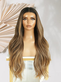 Glueless lace wig with long wavy ombre hair, dark roots to lighter ends
