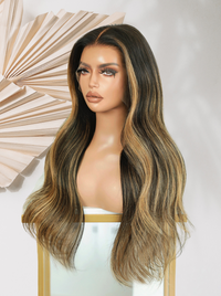 Dark brown long wavy wig with subtle blonde highlights and center part