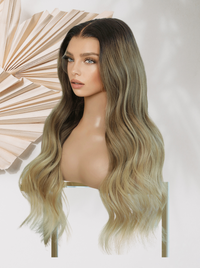 Dark brown wig with caramel blonde ombre ends and center part