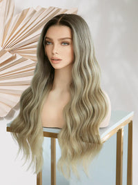 Long wavy wig in ash blonde with thick, beach-wave layers