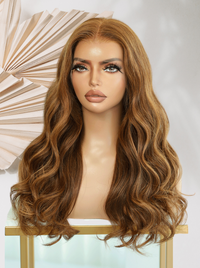 Warm chestnut brown long wavy wig with center part and layered curls