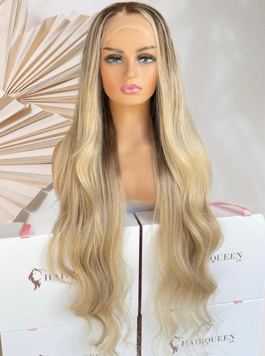 Long wavy light blonde wig with center part, voluminous hair and soft waves