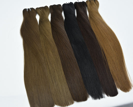 Straight hair weft bundle with mixed dark and light brown strands