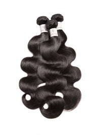 Black human hair bundle with deep loose waves and large curls at ends
