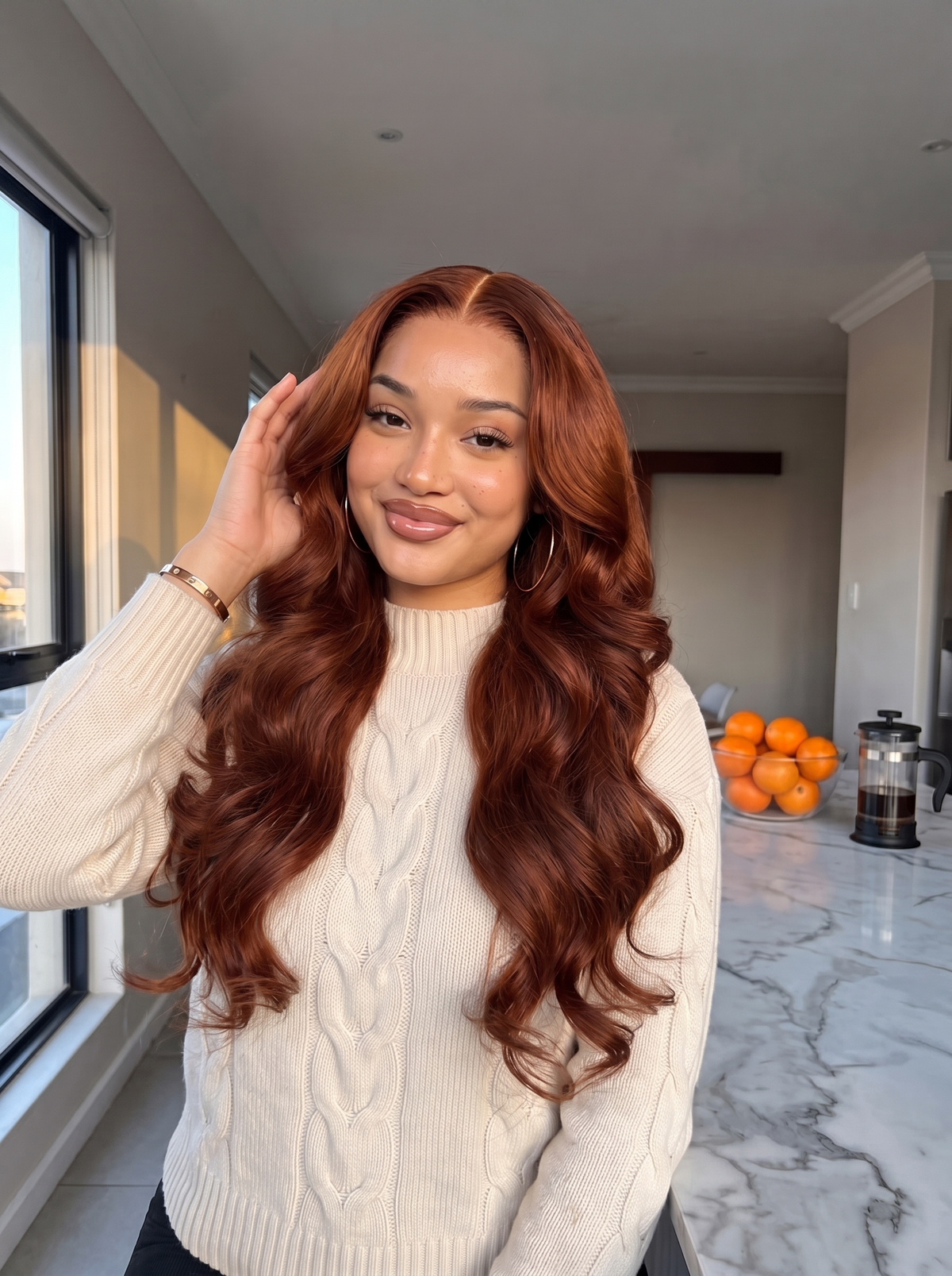 Auburn long wavy lace front wig on model, center part, natural-looking hairline