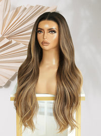 Brown-to-blonde ombre lace front wig with long loose waves