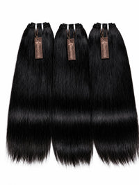Set of four black straight hair bundles with hanging tags
