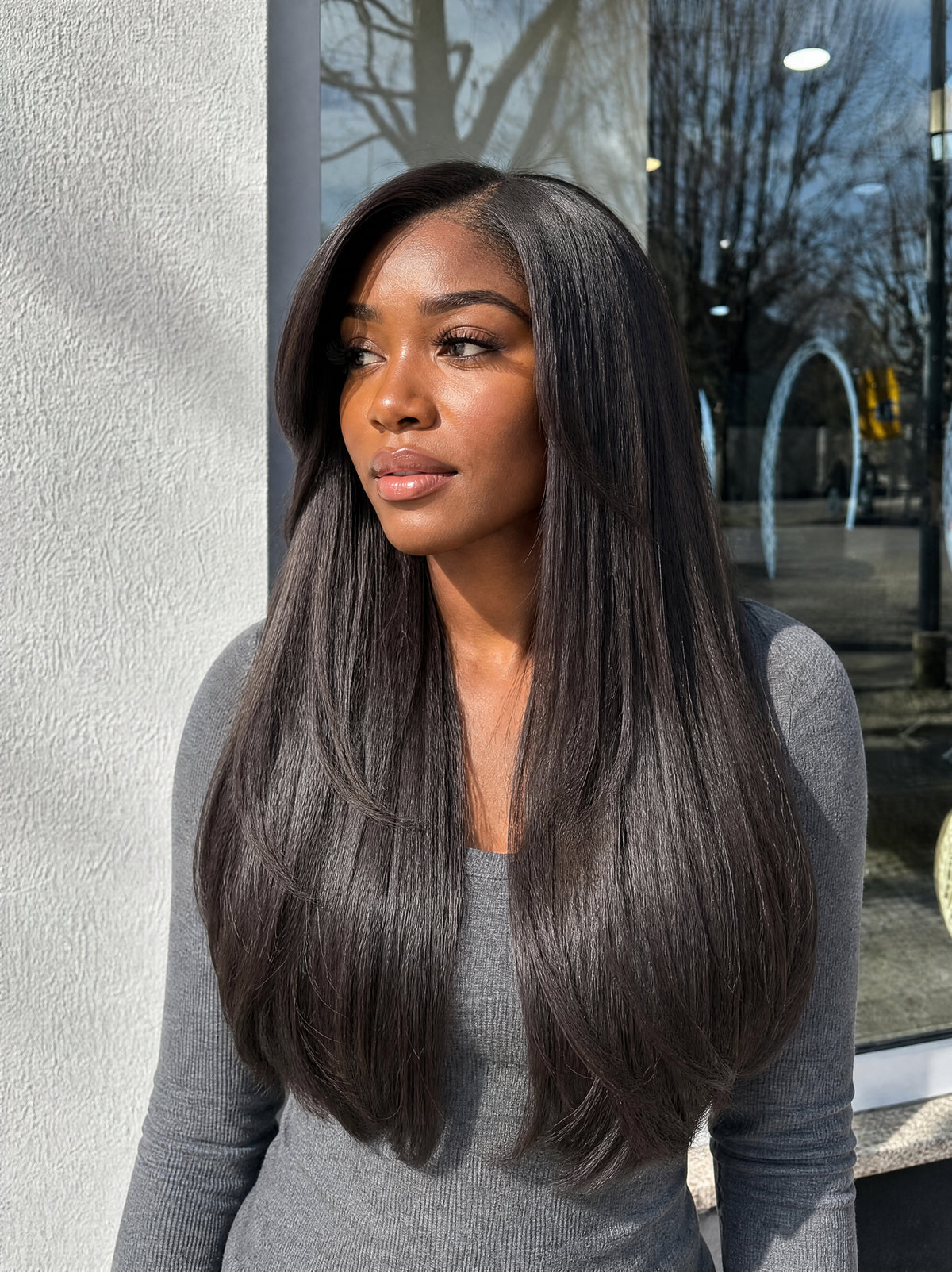 Black long hair worn straight with full, flowing layers