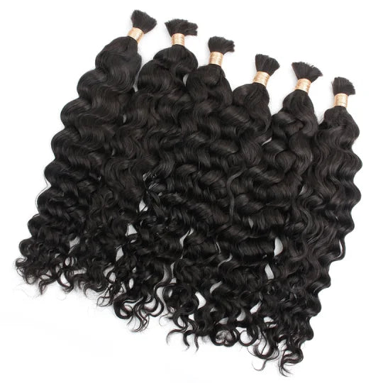 Curly black hair bundles with a thick wave pattern and gold beaded tips