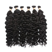 Curly black hair bundle with tight ringlets and gold beaded weft ends