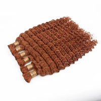 20-inch bulk hair bundle in copper-brown tight curls with visible weft ends
