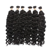 Black curly wave bulk hair bundles with visible gold thread at the tops