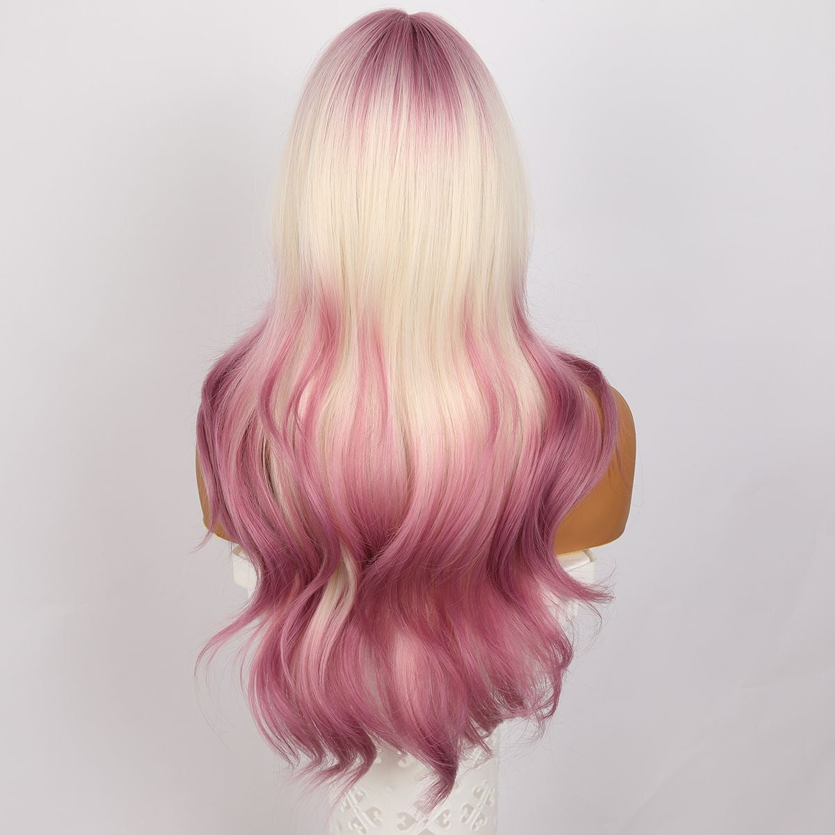 Synthetic blend wavy wig with blonde-to-pink ombre back waves