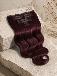 Deep burgundy clip-in hair extensions bundle with soft loose curls
