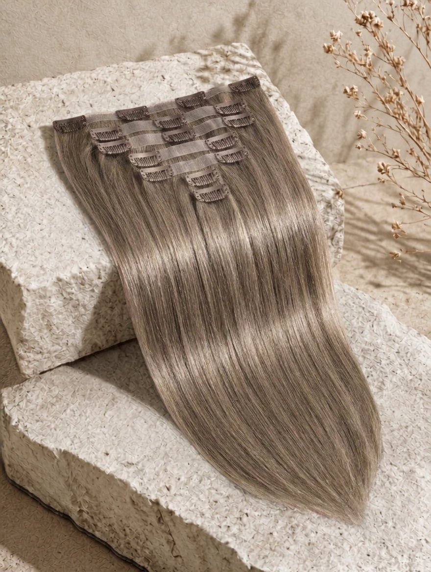 Seamless hair extension weft in ash blonde, straight hair strands