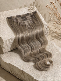 Seamless hair extension weft in ash blonde, loose waves hair strands