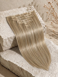 Straight seamless clip-in extensions, long cool blonde hair piece with clip weft
