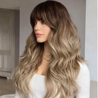 Long synthetic blend wig with side-swept bangs, brown-to-blonde ombre waves