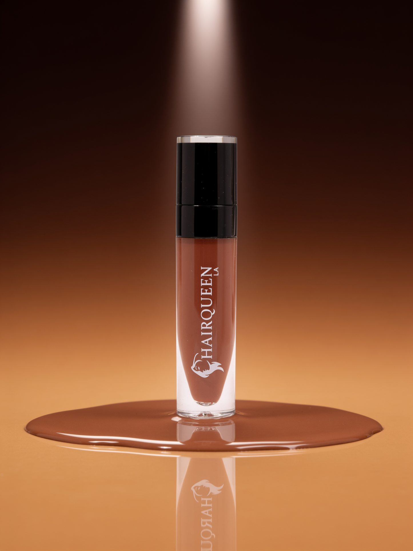 Clear HAROQUEEN lip gloss tube with black cap, nude beige liquid in applicator