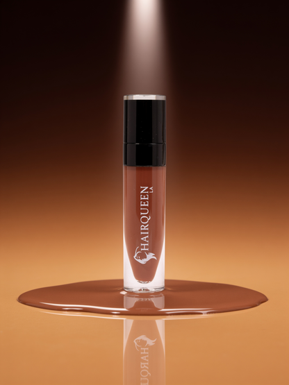 Clear HAROQUEEN lip gloss tube with black cap, nude beige liquid in applicator