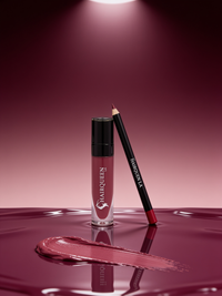 Plum Dynasty lip kit with lip gloss and lipstick pencil, with glossy swatch
