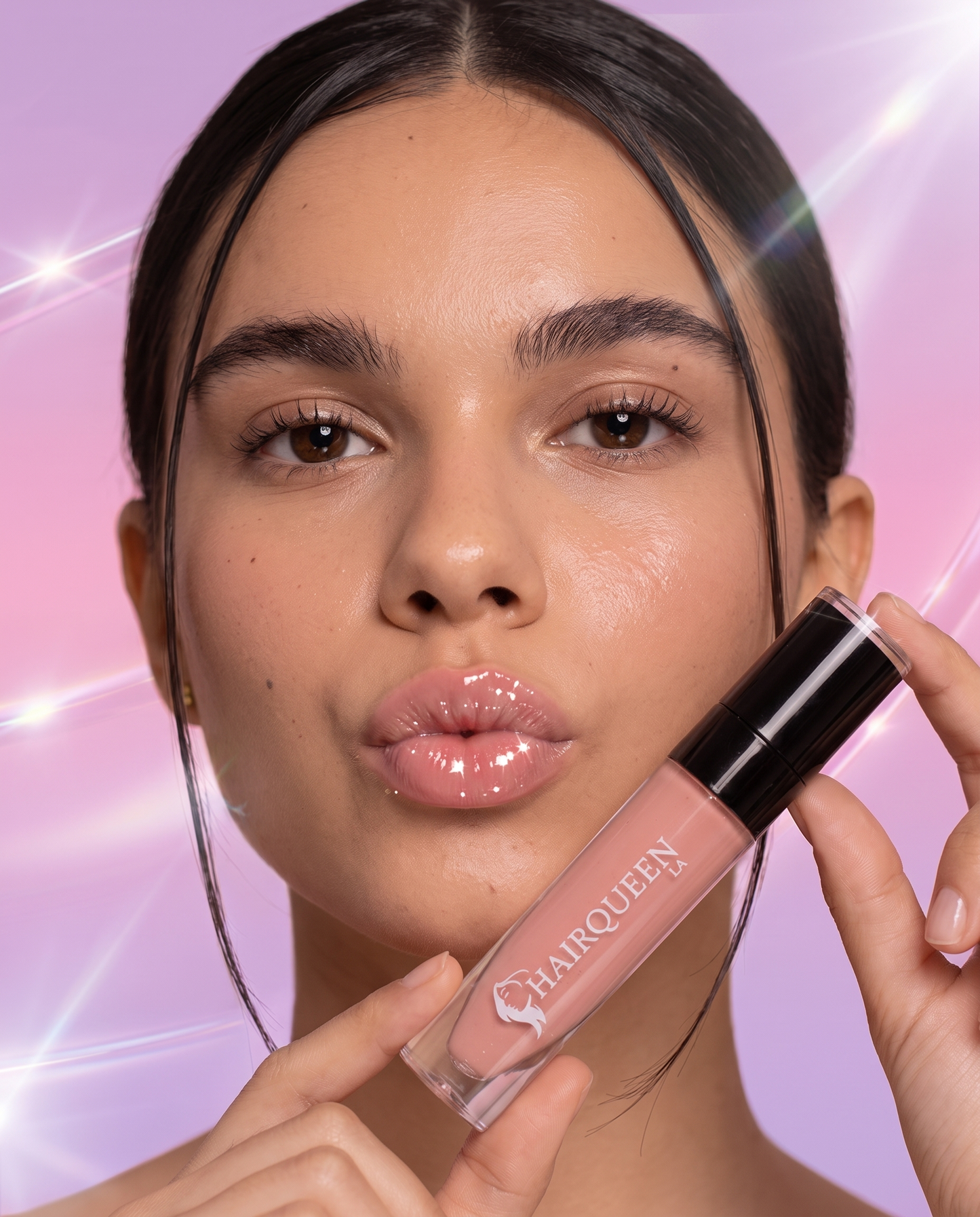 Pink lip gloss tube with wand, glossy pink lips on face