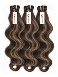 3 wavy brown-and-gray hair bundles with sewn wefts and hanging tags