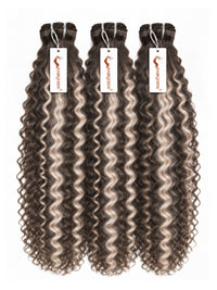 Three hair bundles with curly dark brown and gray highlights, hanging with tags