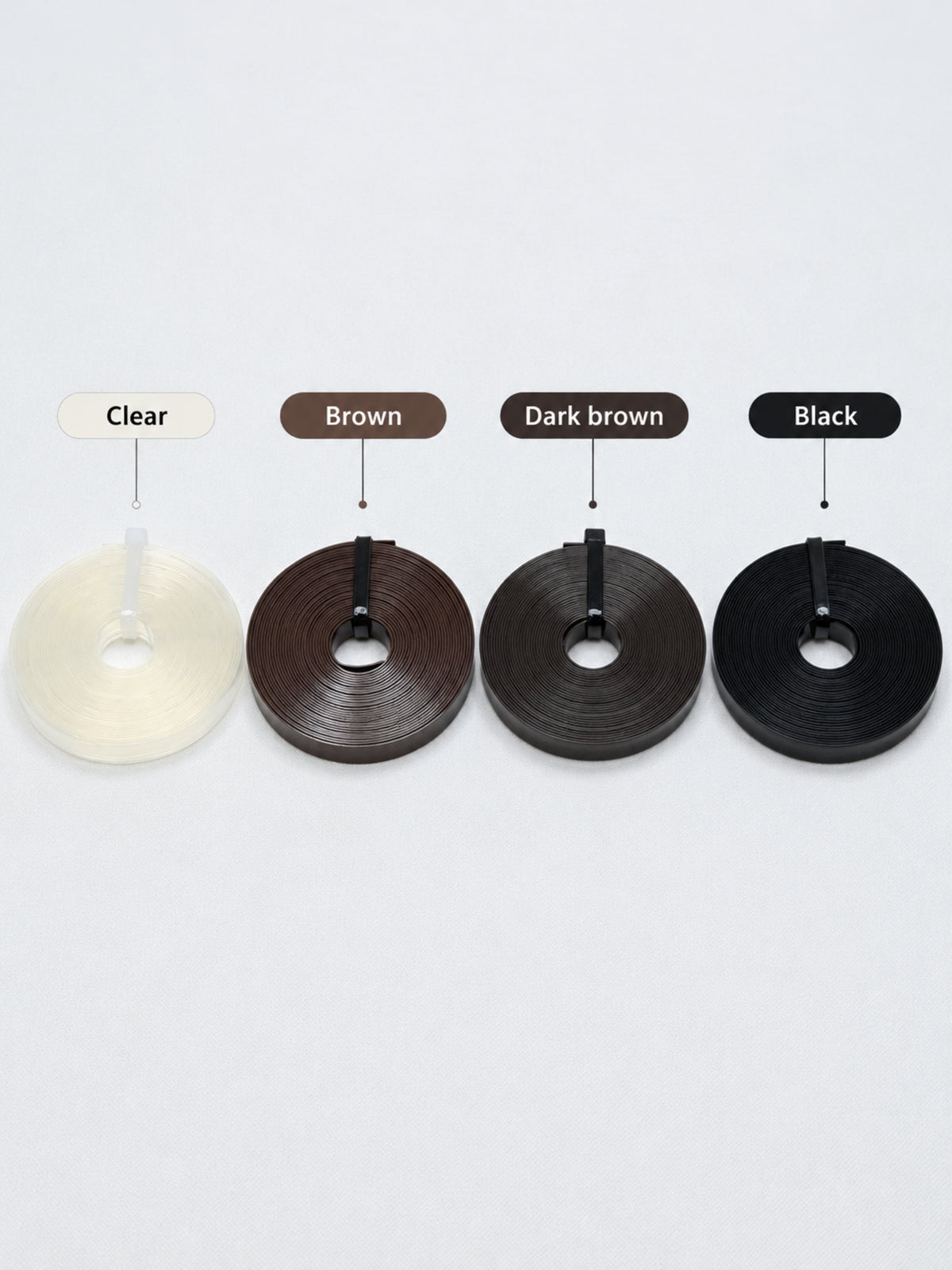 Italian keratin strip color set: clear, brown, dark brown, and black spool rolls