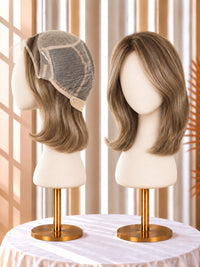 Medium brown bob wig with lace front cap, soft layered waves on mannequin