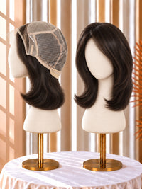 Dark brown bob wig with lace front cap, side view on mannequin head with wavy layers