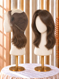 Chestnut brown wig on mannequin with lace cap top and shoulder-length hair