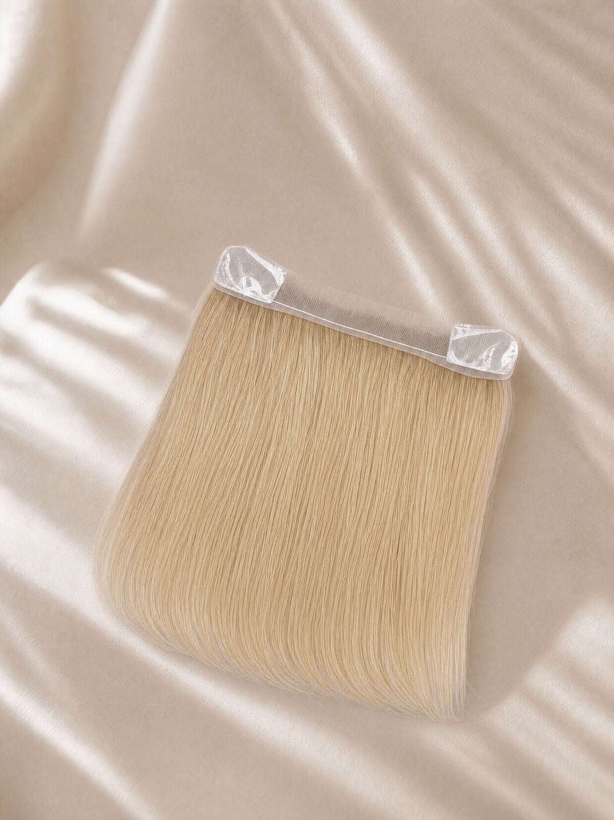 Lace hairline topper with straight light blonde hair and clear lace base