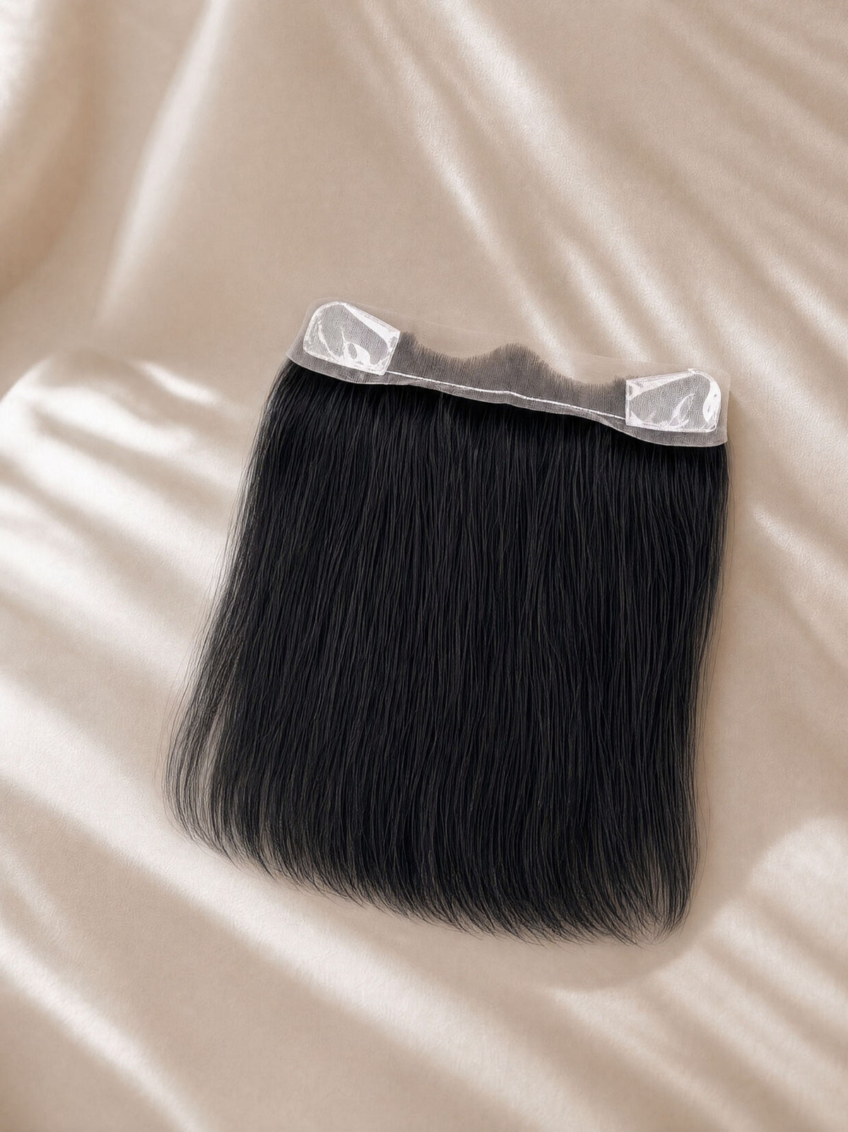 Lace hairline topper with lace base and clear attachment strip, straight black hair