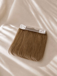 Lace hairline topper with medium brown straight hair and a clear lace base