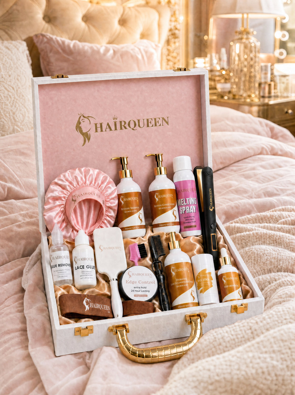 HairQueen wig care kit in open box with bottles, pink lace cap, and styling tools on bed