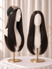 Dark long lace-front medical wig on mannequin head, straight sleek style